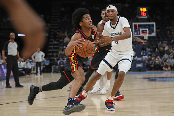 Atlanta Hawks guard Sharife Cooper (2) drives to the basket as Memphis Grizzles forward Ziaire Williams (8) defends during the first half at FedExForum.
